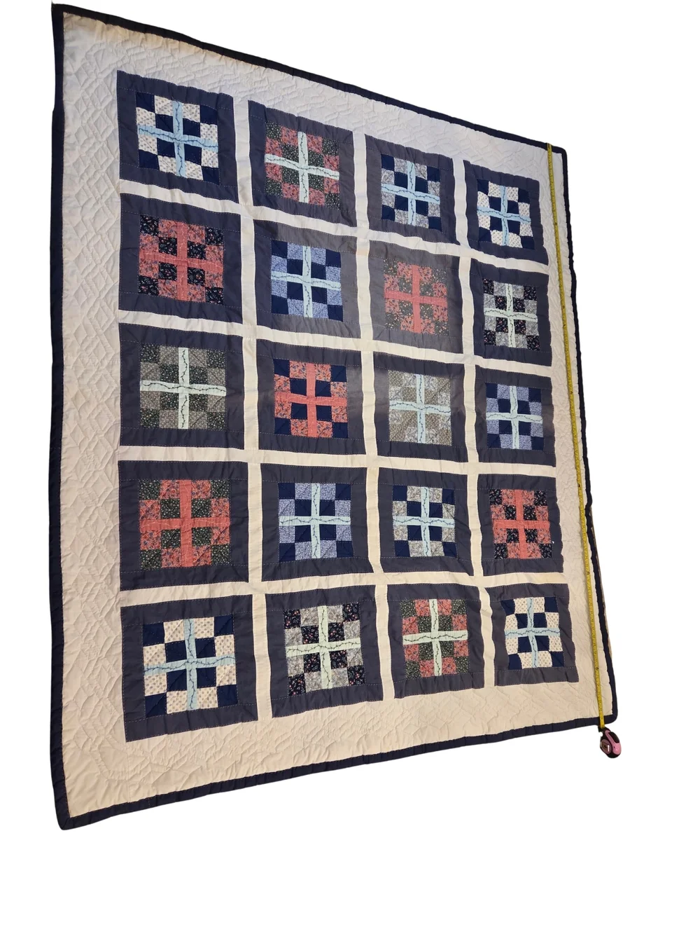 Patchwork Navy and Cream Quilt with Blue and Coral Accents